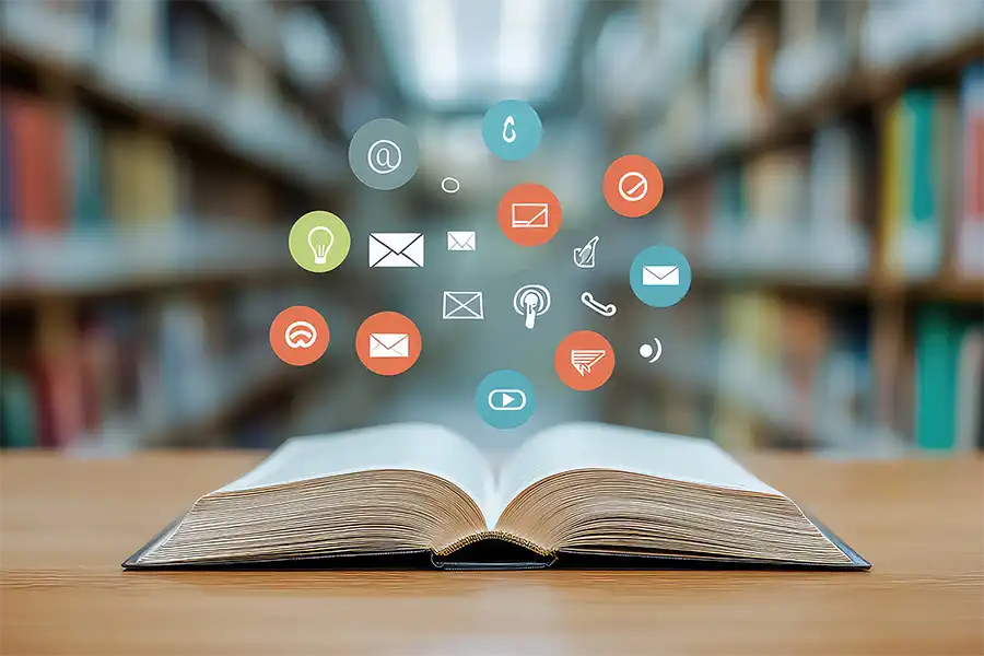 open book with floating icons of email, chat, and social media platforms